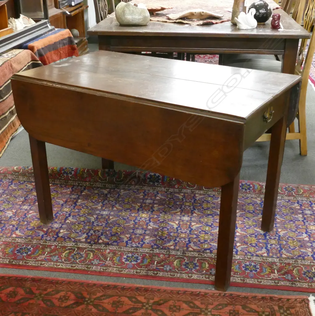 A George III oak drop-side table Image 1++