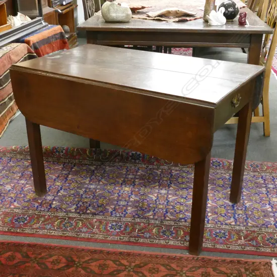 A George III oak drop-side table