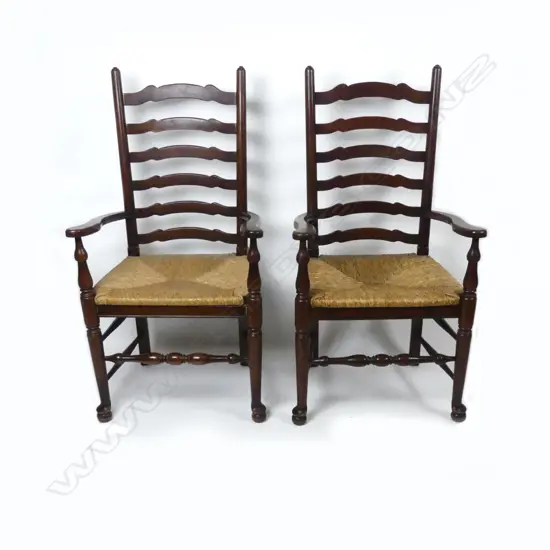 A good set of eight George III country style oak ladderback chairs