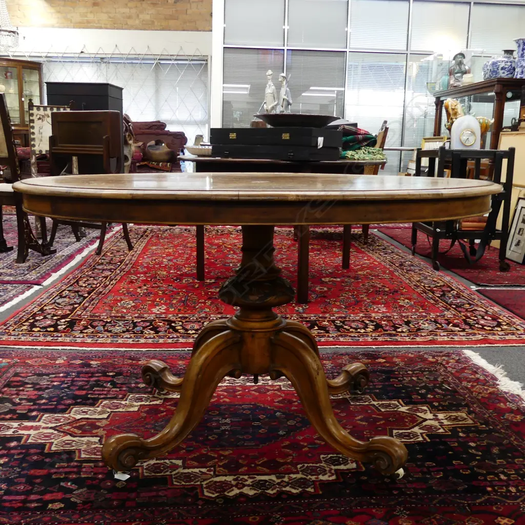A Victorian burr walnut oval loo table Image 1++
