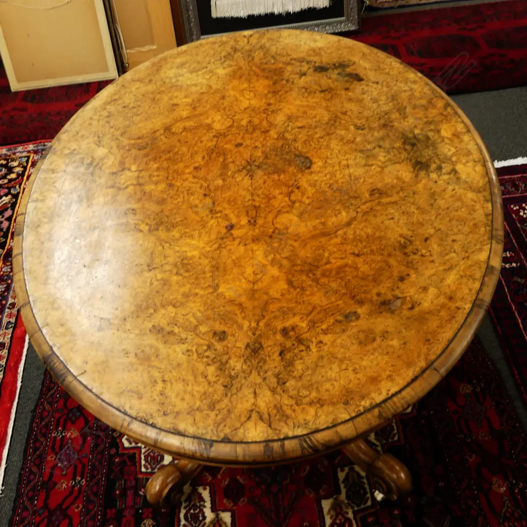 A Victorian burr walnut oval loo table Image 1++
