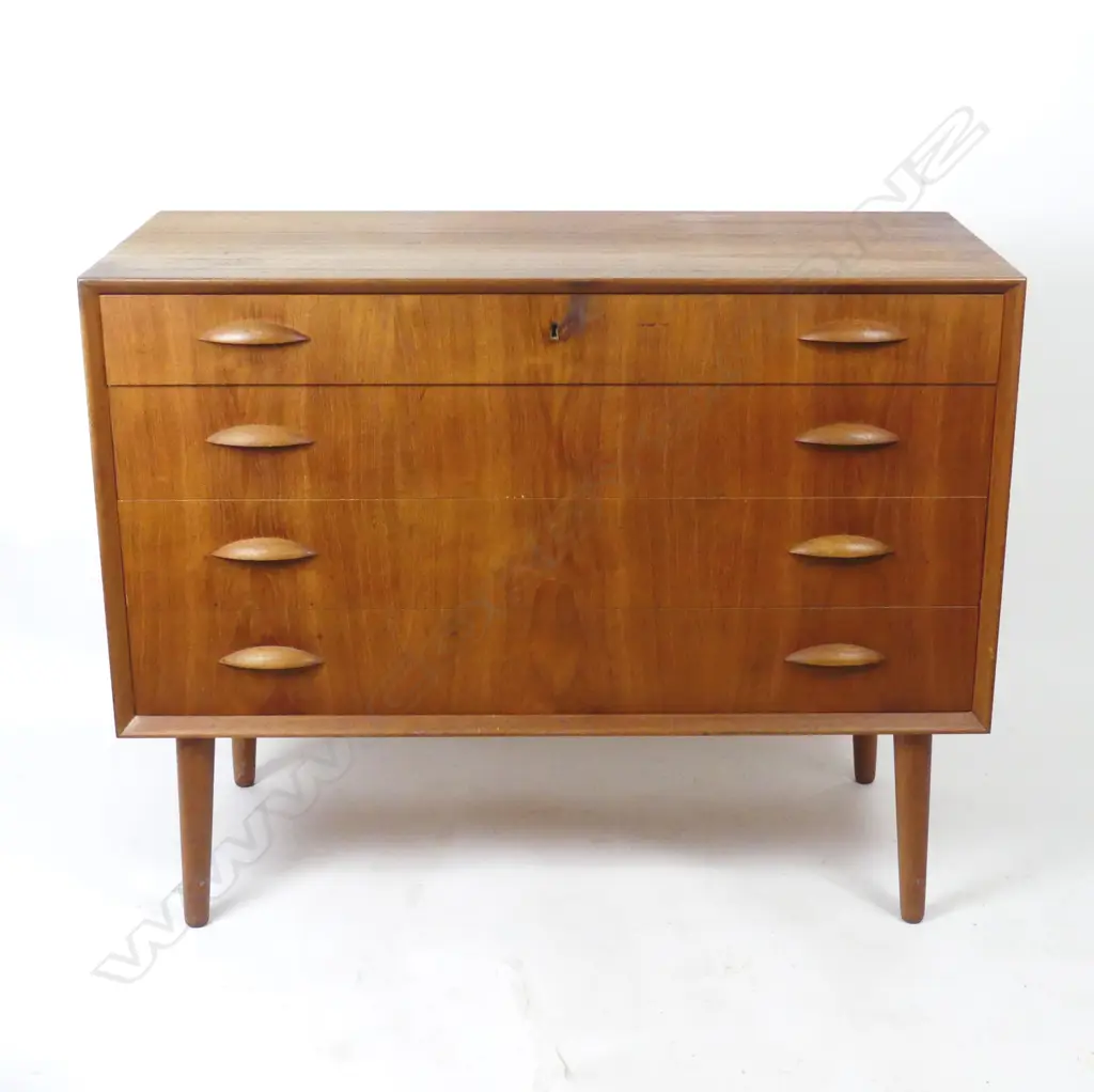 A Danish mid-century teak chest of four drawers Image 1++