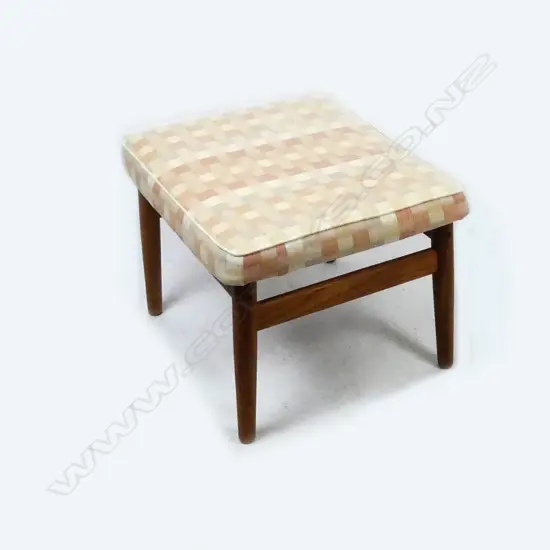 A Danish ottoman stool designed by Arne Vodder