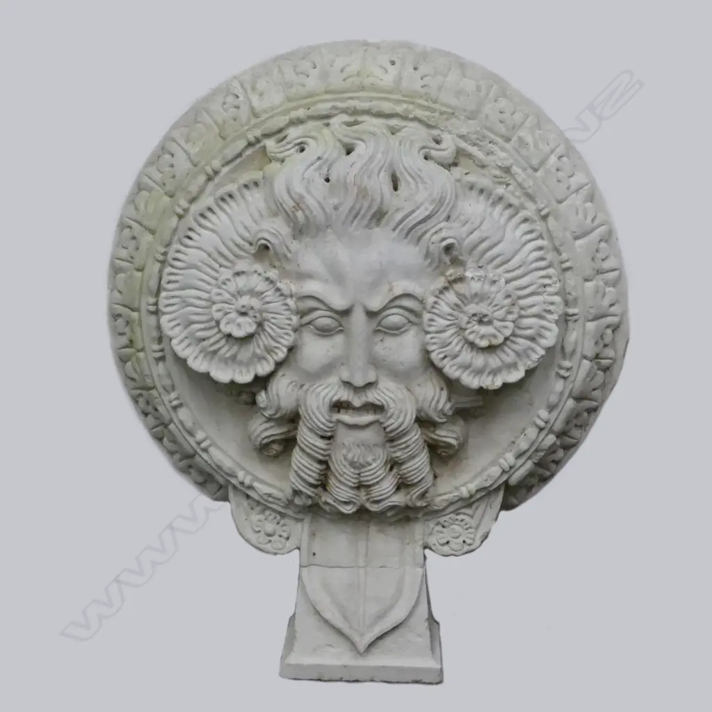 A 'marble' garden ornament depicting the head of Jupiter Image 1++