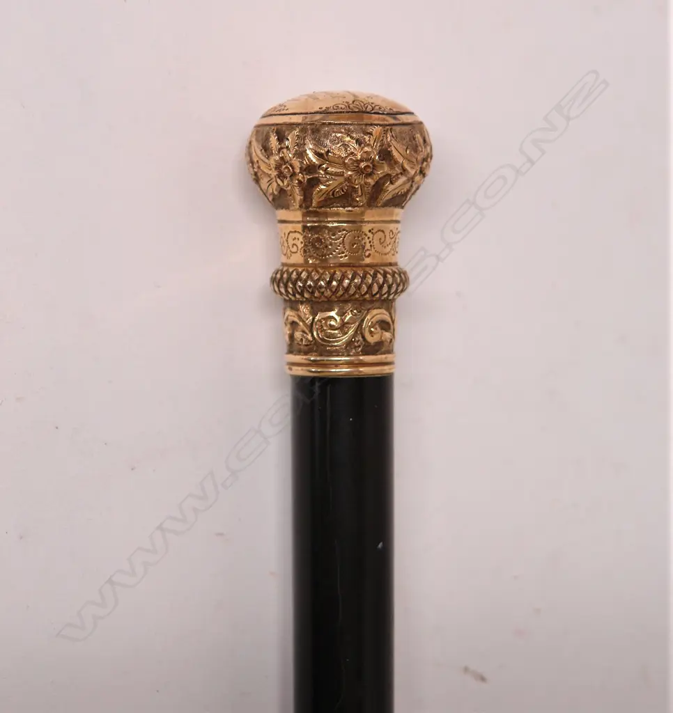 A 19thC fancy gold plated handled ebonised walking stick Image 1++