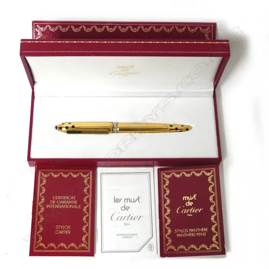 An as new Cartier gold plated Panthère ball-point pen