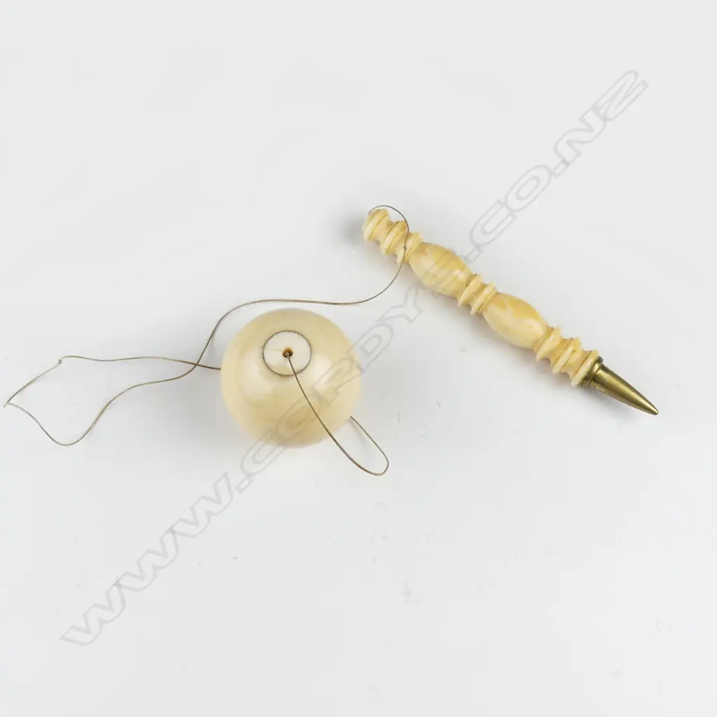 An ivory bilboquet (ball and catch) game Image 1++
