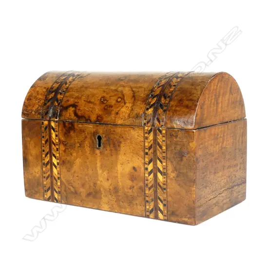 A Victorian walnut dome top tea caddy