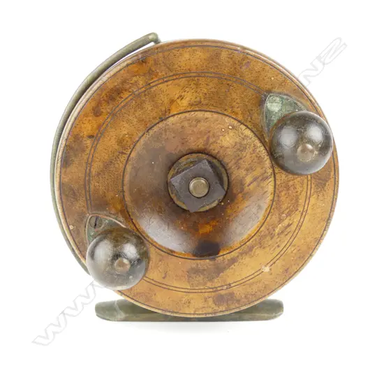 A 4" walnut star back reel made for McCarthy's Dunedin c.1910