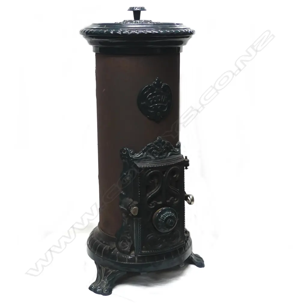 A circa 1900 Godin enamel and steel coal burning heater Image 1++