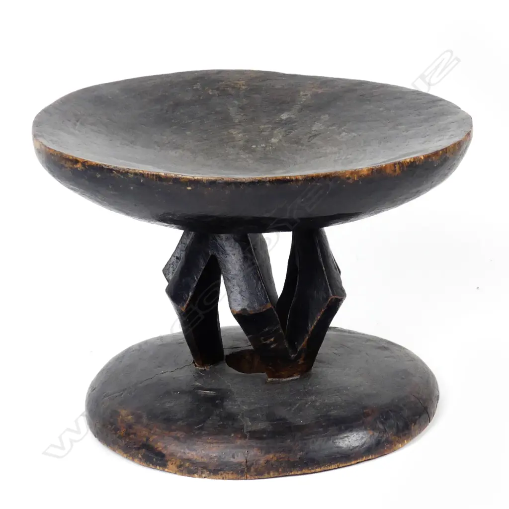 An African wooden stool Image 1++