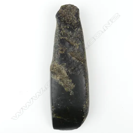 A large Maori pre-European pounamu toki (greenstone adze)