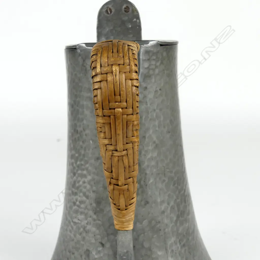 A Tudric pewter hot water jug designed by Archibald Knox for Liberty & Co. Image 1++