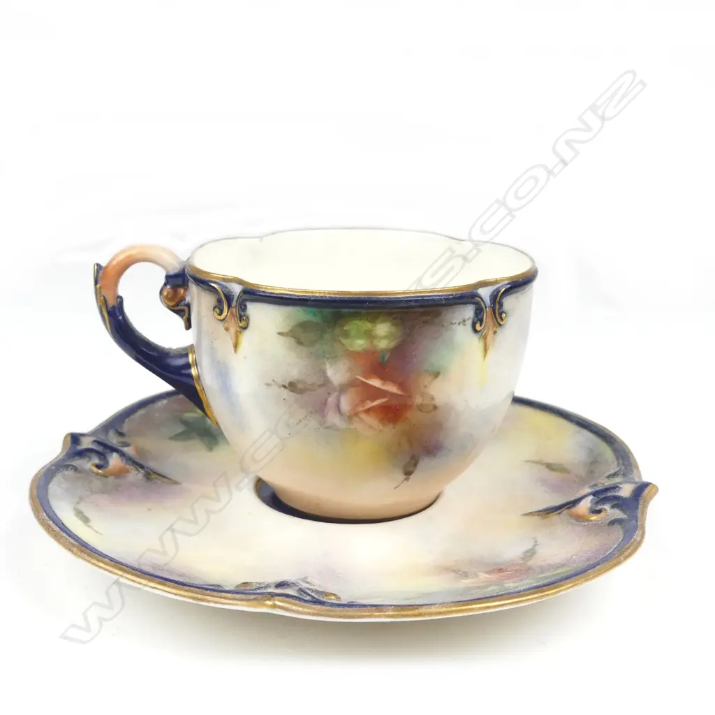 A Hadley's Worcester cabinet cup and saucer Image 1++