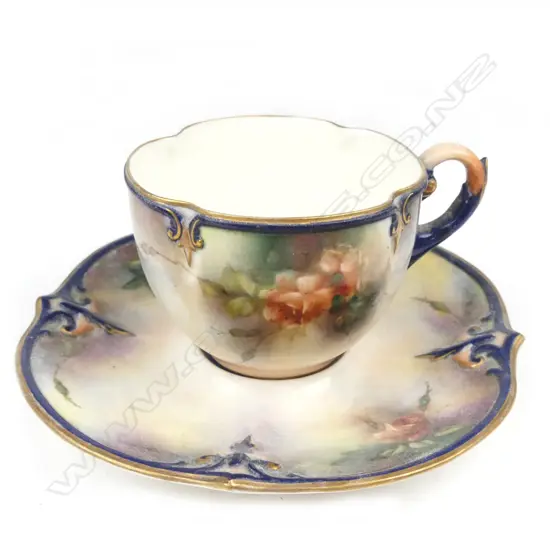 A Hadley's Worcester cabinet cup and saucer