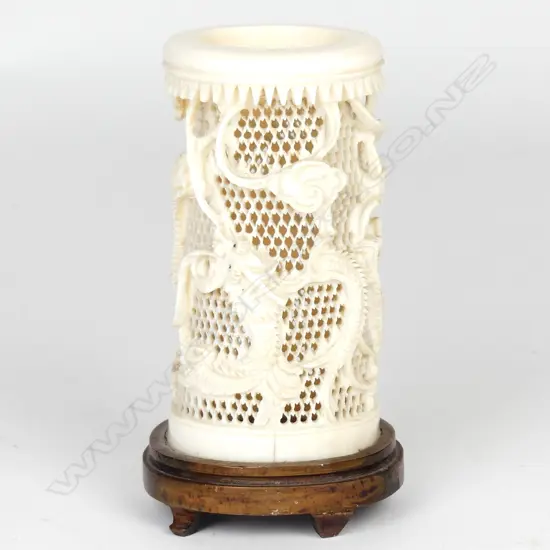 A Chinese carved ivory brush pot
