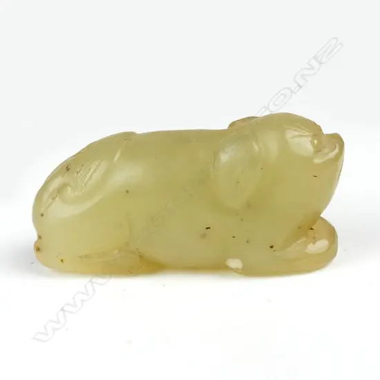 A small Chinese carved jade animal pendant toggle