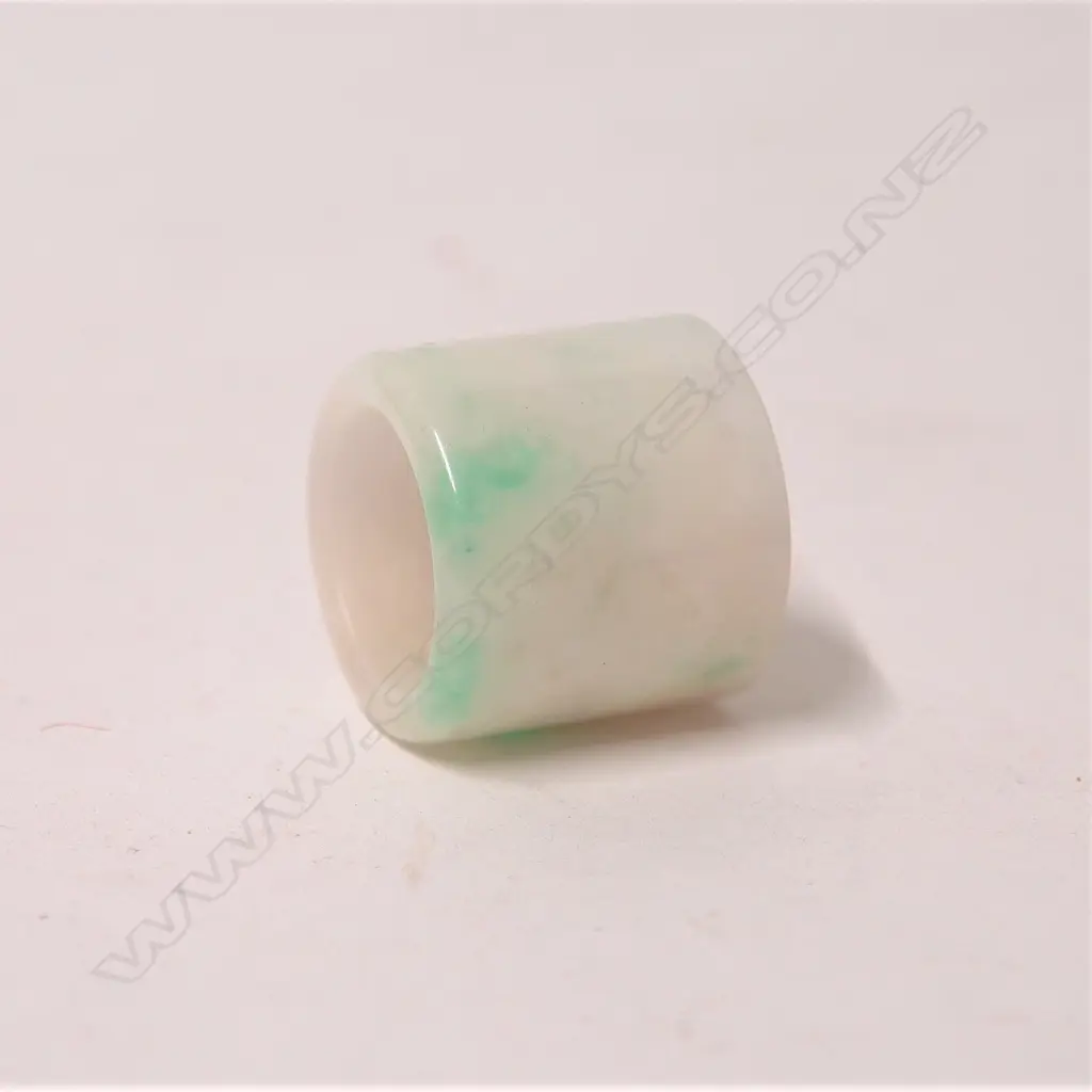 A Chinese white mottled jade archer's ring Image 1++