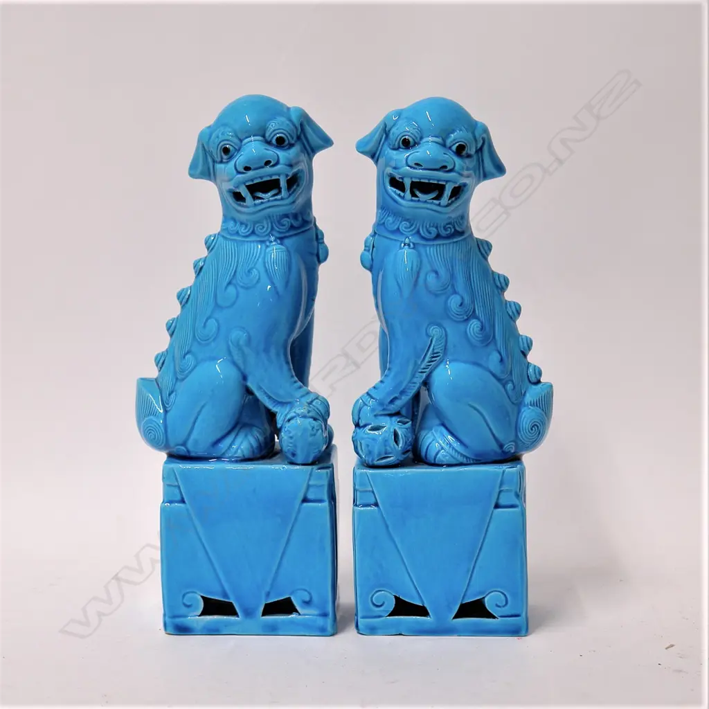 A pair of Chinese turquoise glazed foo dogs Image 1++