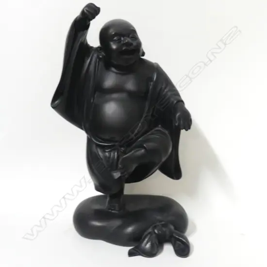 A dark patina bronze statue of Hotei