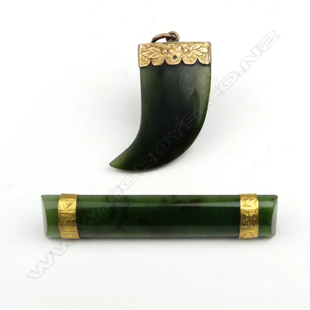 Two N.Z. colonial gold mounted greenstone jewellery pieces Image 1++
