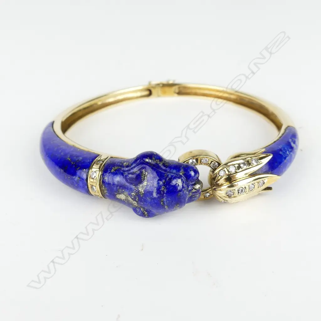 A 14ct gold lapis lazuli and diamond bangle in Cartier style Image 1++