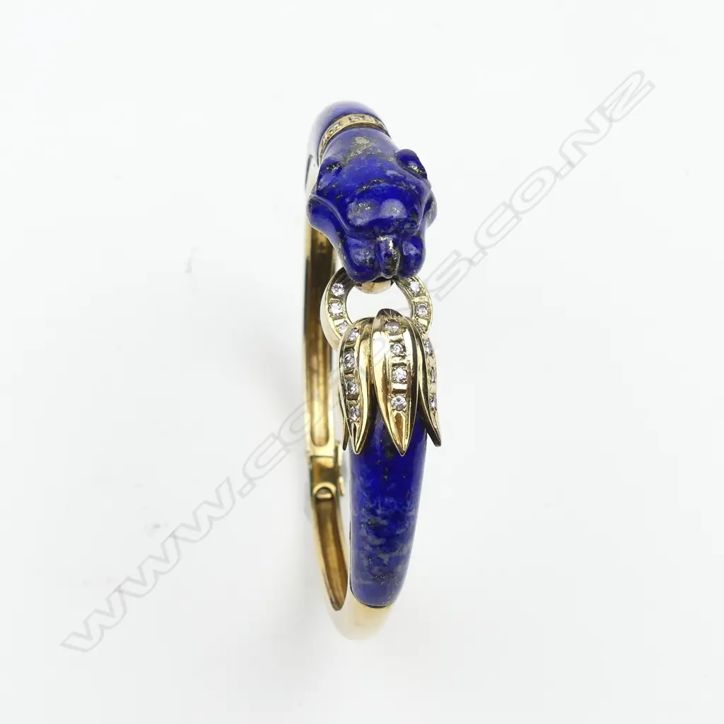 A 14ct gold lapis lazuli and diamond bangle in Cartier style Image 1++