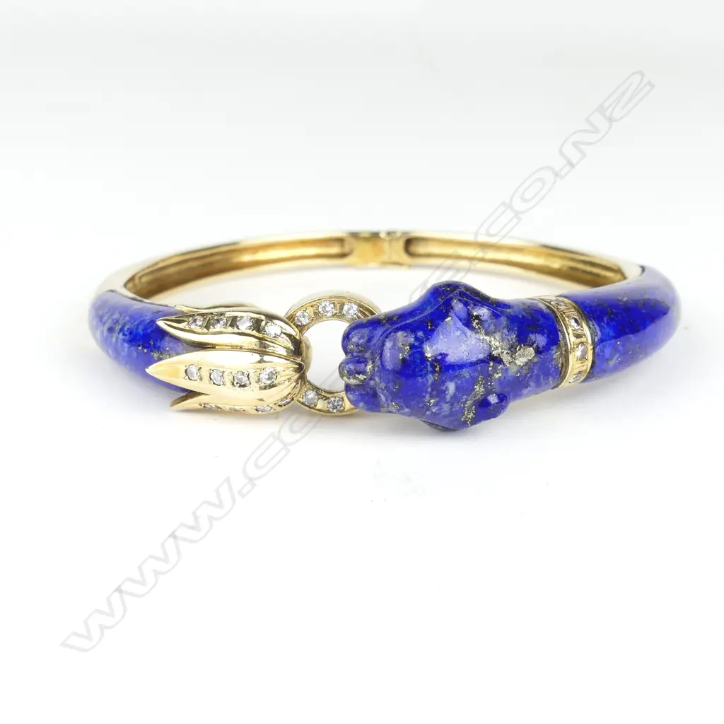 A 14ct gold lapis lazuli and diamond bangle in Cartier style Image 1++