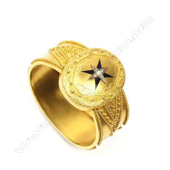 An impressive Victorian 18ct gold hinged bangle