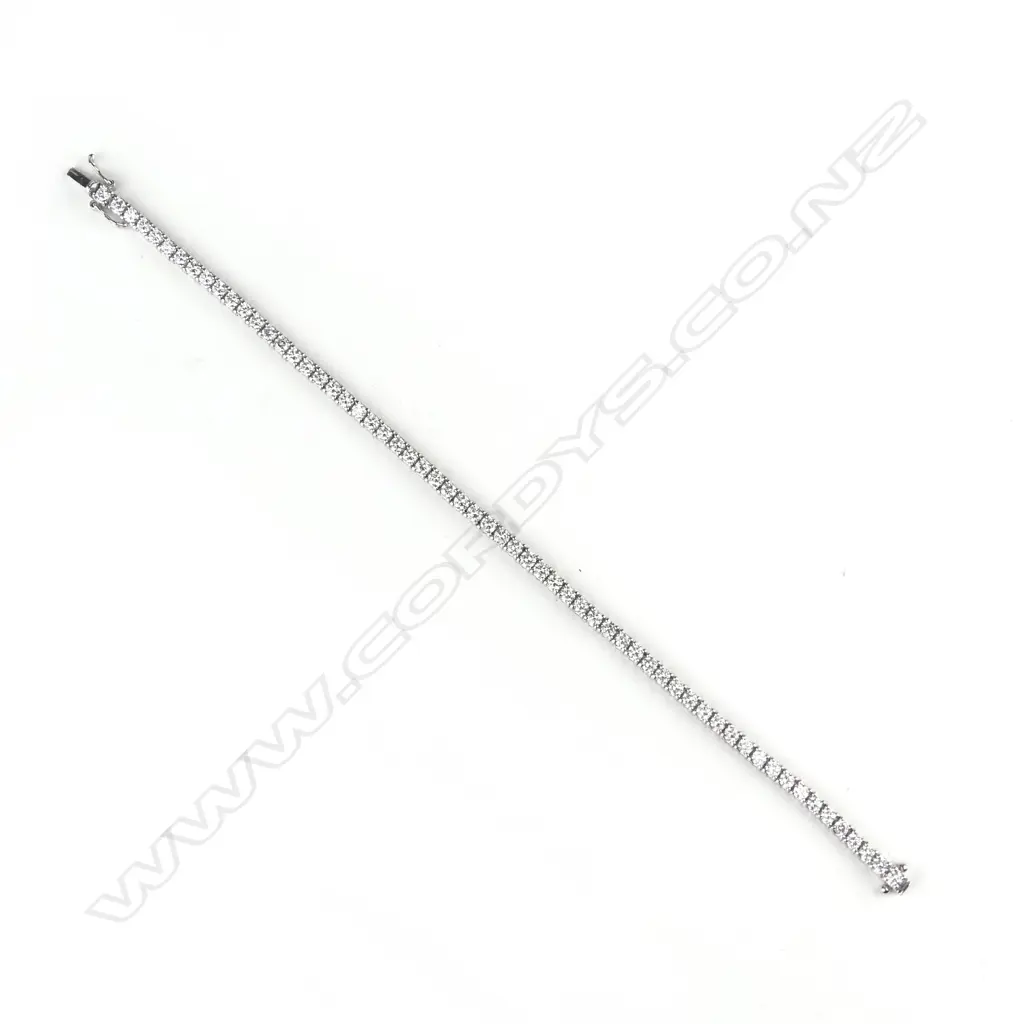 A lady's modern 18ct. white gold and multi-diamond tennis bracelet Image 1++