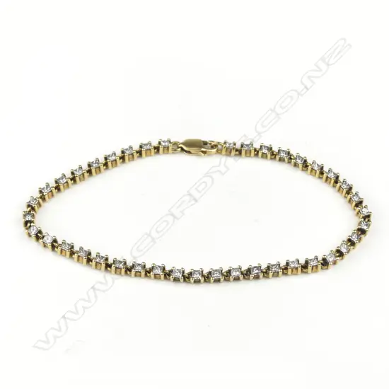 An 18ct yellow gold and diamond tennis bracelet