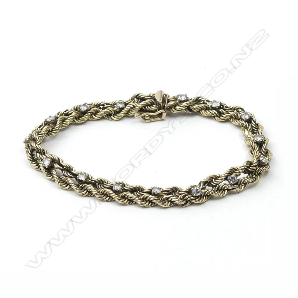 An estate 14ct. yellow gold and diamond bracelet Image 1++