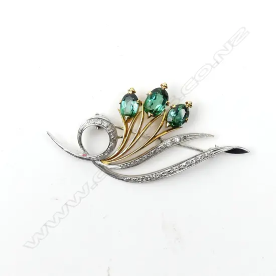 An 18ct yellow and white gold diamond and tourmaline brooch