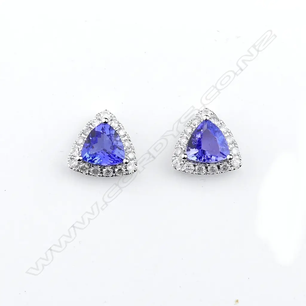 A pair of 14ct white gold tanzanite and diamond earrings Image 1++