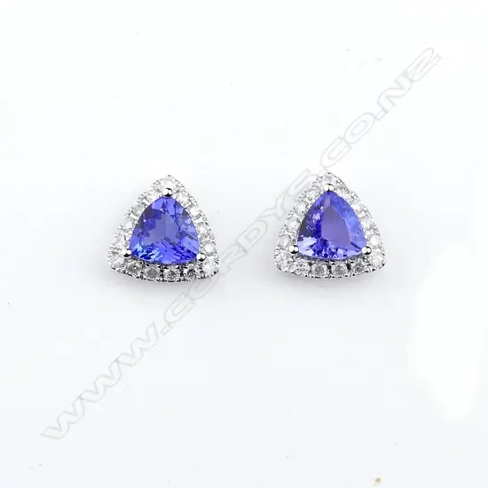 A pair of 14ct white gold tanzanite and diamond earrings