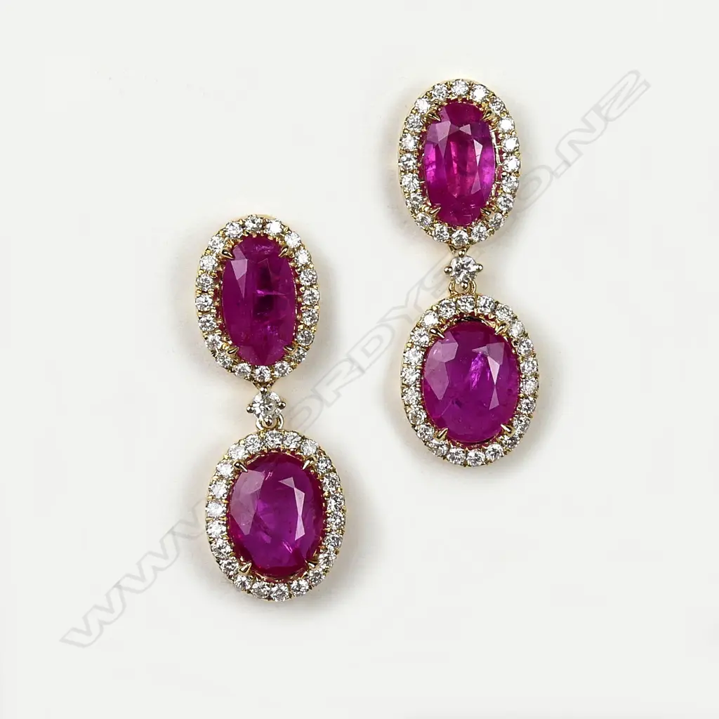 A pair of 14ct gold ruby and diamond drop earrings Image 1++