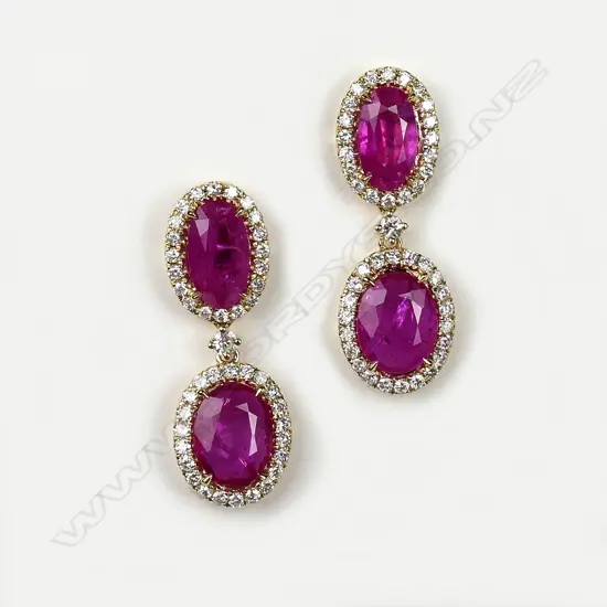 A pair of 14ct gold ruby and diamond drop earrings
