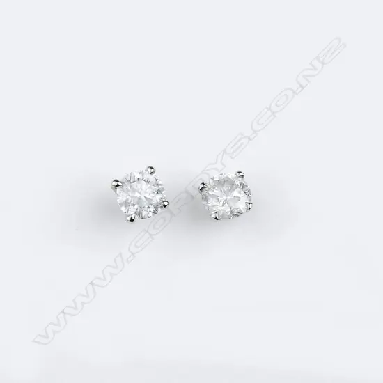 A pair of 14ct white gold and diamond stud earrings