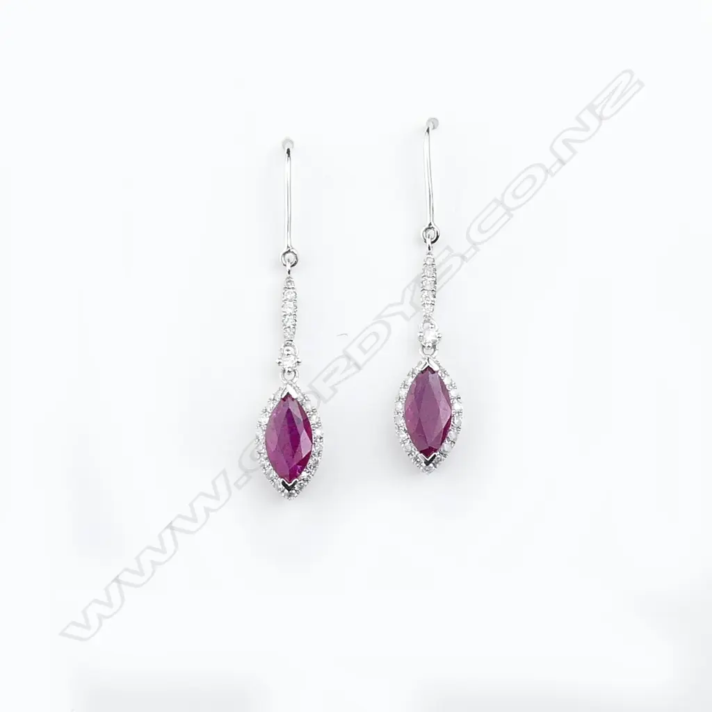 A pair of 14ct white gold diamond and ruby earrings Image 1++