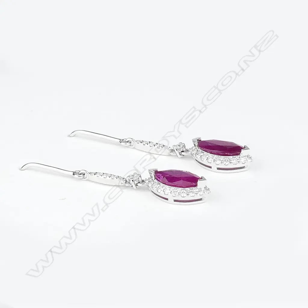A pair of 14ct white gold diamond and ruby earrings Image 1++