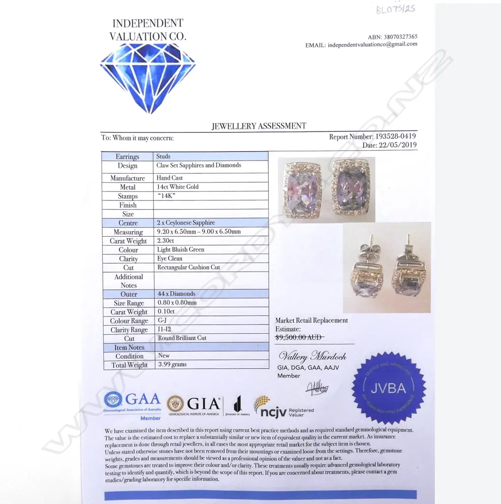 A pair of 14ct white gold sapphire and diamond stud earrings Image 1++