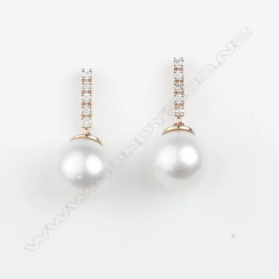 A pair of 14ct rose gold pearl and diamond earrings