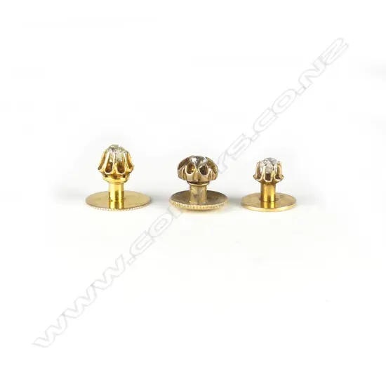 Three vintage gold and diamond set shirt studs