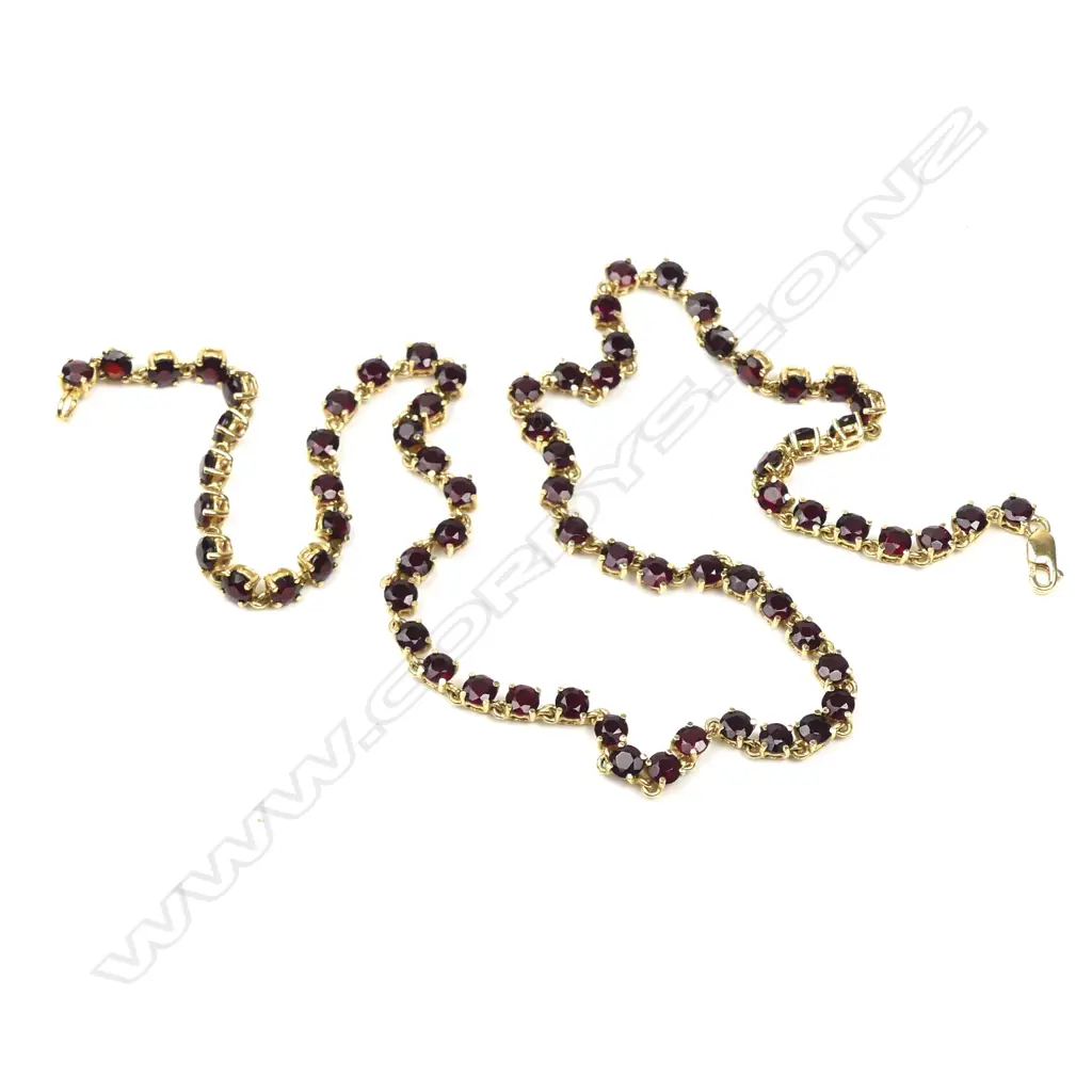 An 18ct gold and Bohemian garnet necklace Image 1++