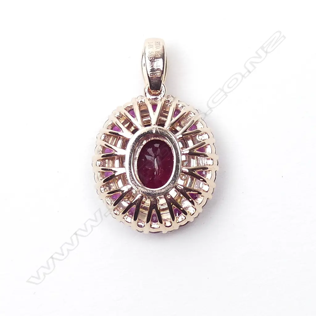 A 14ct rose gold ruby and diamond pendant Image 1++