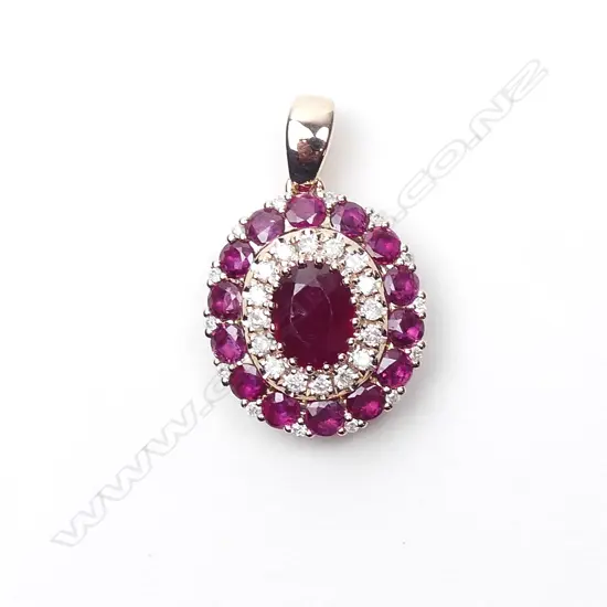 A 14ct rose gold ruby and diamond pendant