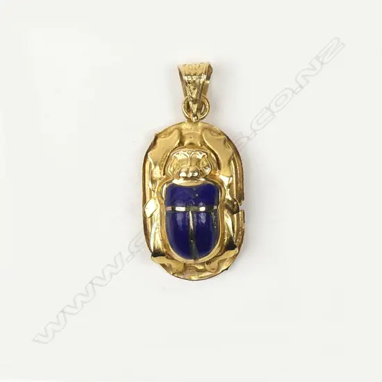 An Egyptian 12ct gold and lapis lazuli pendant