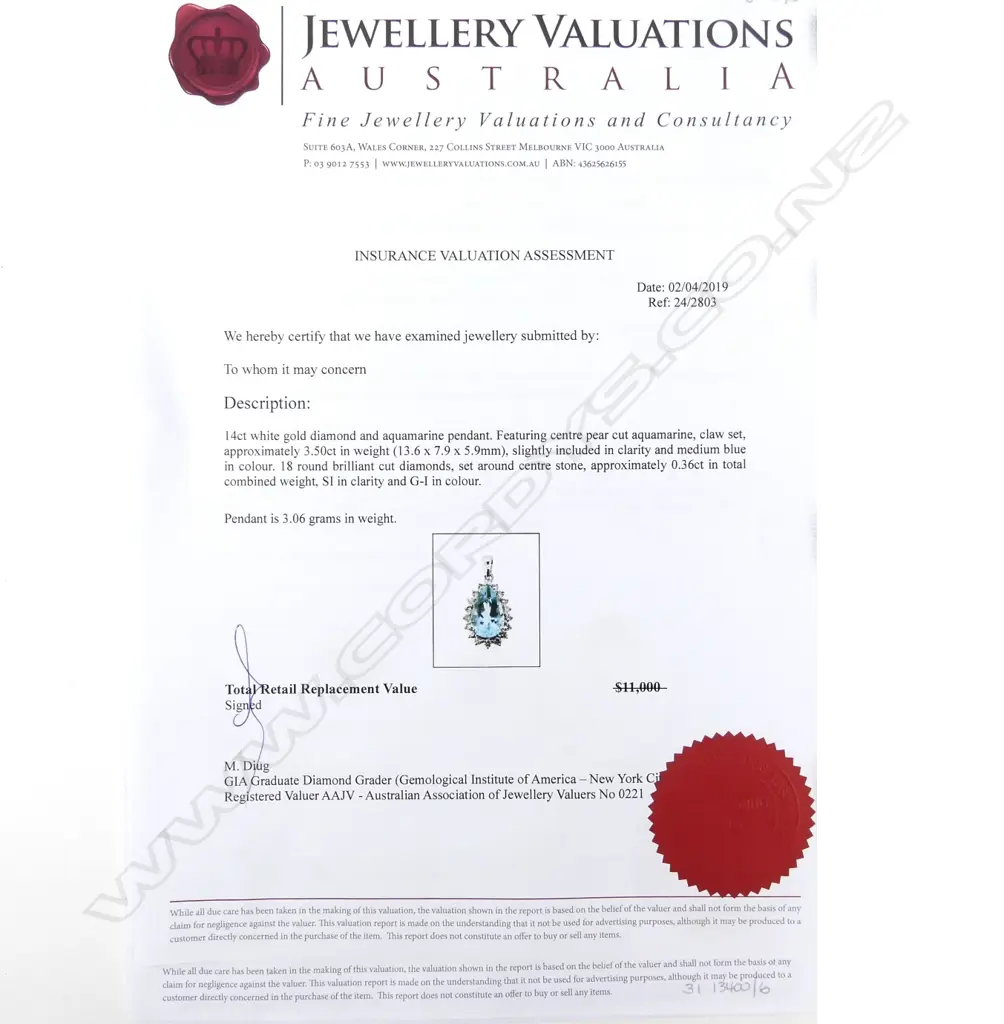 A 14ct white gold aquamarine and diamond pendant Image 1++