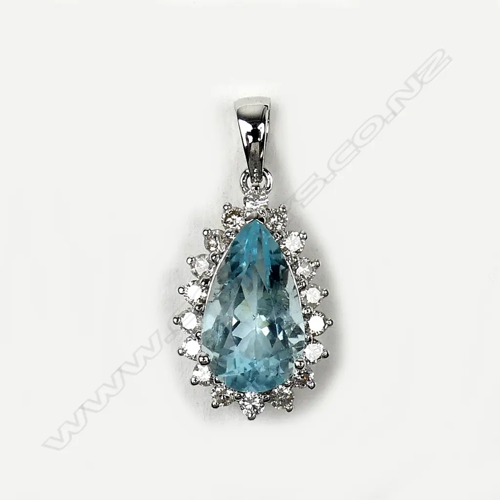 A 14ct white gold aquamarine and diamond pendant Image 1++