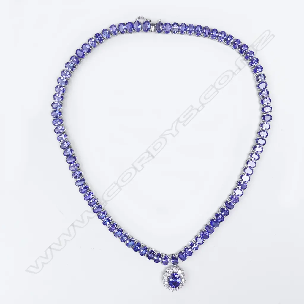 A 14ct white gold tanzanite and diamond pendant necklace Image 1++
